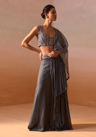 Grey Shimmer Draped Sari And Blouse by Nitika Gujral, available on Indiaspopup.com