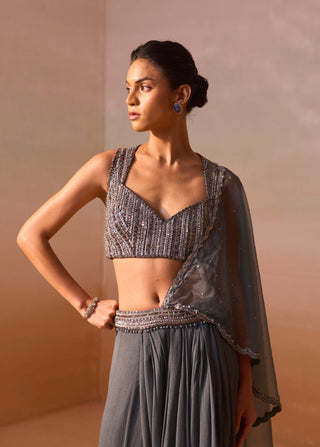 Grey Shimmer Draped Sari And Blouse by Nitika Gujral, available on Indiaspopup.com