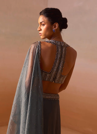 Grey Shimmer Draped Sari And Blouse by Nitika Gujral, available on Indiaspopup.com