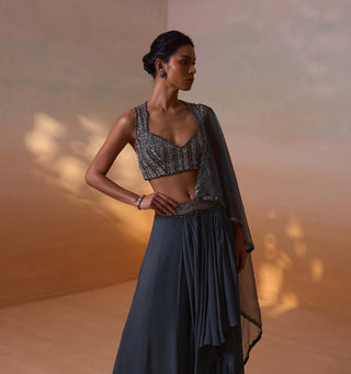 Grey Shimmer Draped Sari And Blouse by Nitika Gujral, available on Indiaspopup.com