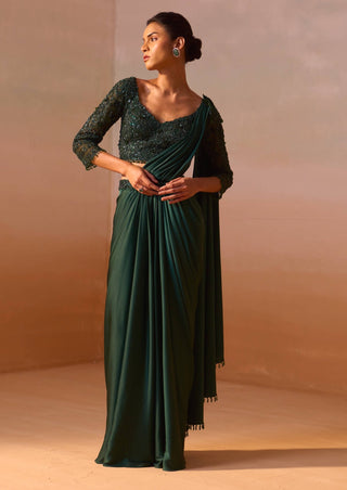 Bottle Green Draped Sari And Blouse by Nitika Gujral, available on Indiaspopup.com