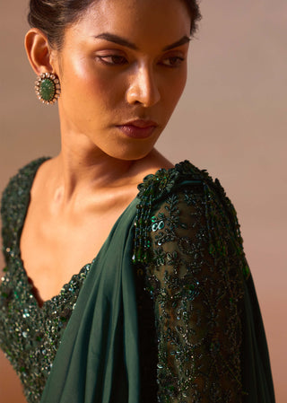 Bottle Green Draped Sari And Blouse by Nitika Gujral, available on Indiaspopup.com