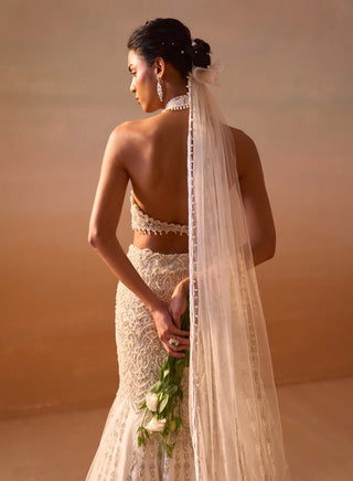 Ivory fishtailed skirt and halter blouse