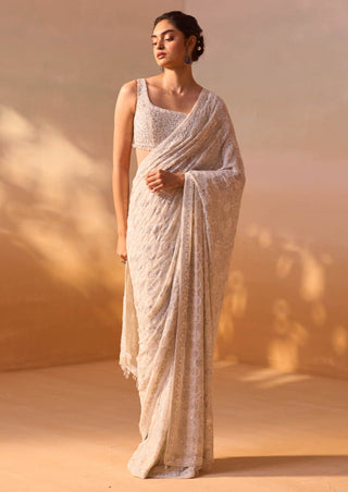 Ivory Georgette Heavy Sari Set by Nitika Gujral, available on Indiaspopup.com