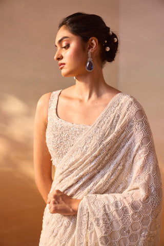 Ivory Georgette Heavy Sari Set by Nitika Gujral, available on Indiaspopup.com