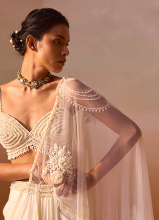 Ivory Pearl Worked Draped Sari And Blouse by Nitika Gujral, available on Indiaspopup.com