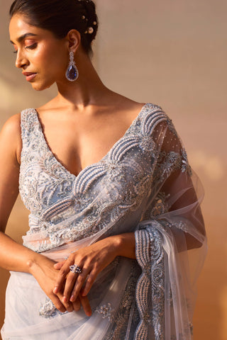 Powder Blue Sari And Blouse by Nitika Gujral, available on Indiaspopup.com