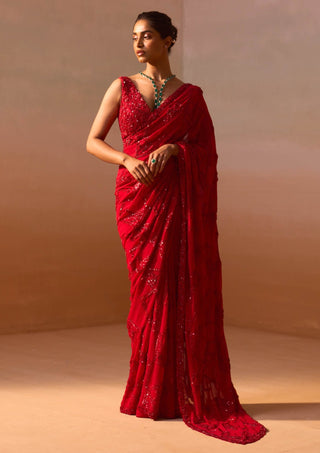 Red Heavy Georgette Sari And Blouse by Nitika Gujral, available on Indiaspopup.com