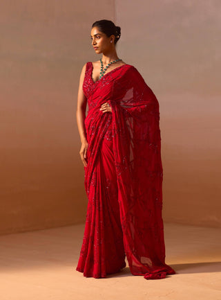 Red Heavy Georgette Sari And Blouse by Nitika Gujral, available on Indiaspopup.com