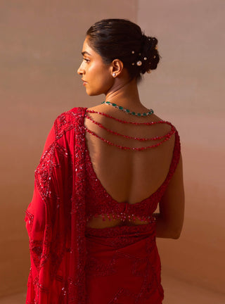 Red Heavy Georgette Sari And Blouse by Nitika Gujral, available on Indiaspopup.com