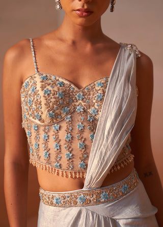 Powder Blue Draped Sari And Blouse by Nitika Gujral, available on Indiaspopup.com