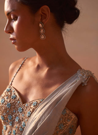 Powder Blue Draped Sari And Blouse by Nitika Gujral, available on Indiaspopup.com