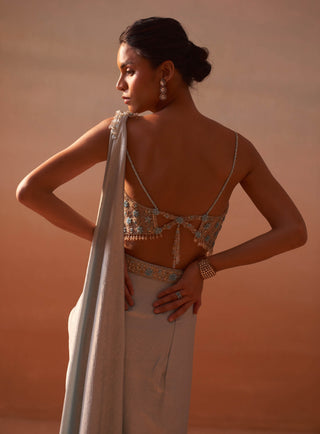 Powder Blue Draped Sari And Blouse by Nitika Gujral, available on Indiaspopup.com