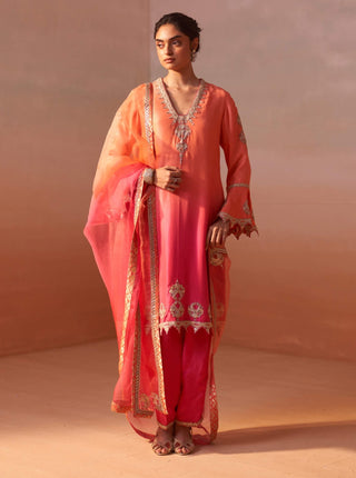 Carrot Orange Kurta And Salwar Set by Nitika Gujral, available on Indiaspopup.com