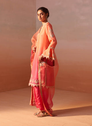 Carrot Orange Kurta And Salwar Set by Nitika Gujral, available on Indiaspopup.com