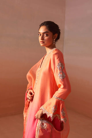 Carrot Orange Kurta And Salwar Set by Nitika Gujral, available on Indiaspopup.com