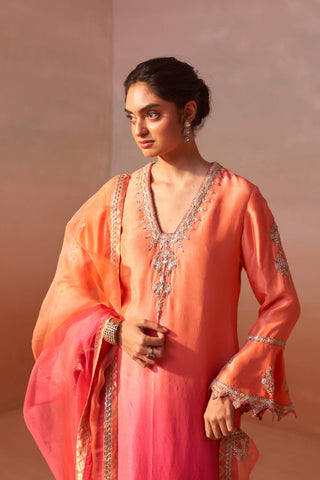 Carrot Orange Kurta And Salwar Set by Nitika Gujral, available on Indiaspopup.com