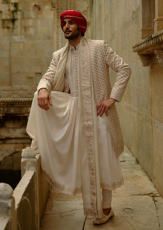 Cream sherwani jacket with choga and churidar set