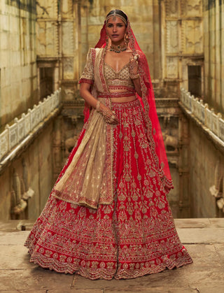 Red raw silk lehenga and gold choli set
