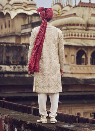 Light Beige Raw Silk Sherwani Set by Nitika Gujral Men available on Indiaspopup.com