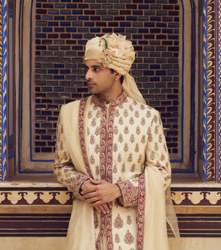 Beige Zardozi Embroidery Sherwani Set by Nitika Gujral Men available on Indiaspopup.com