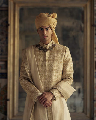 Gold Benarsi Brocade Sherwani Set by Nitika Gujral Men available on Indiaspopup.com