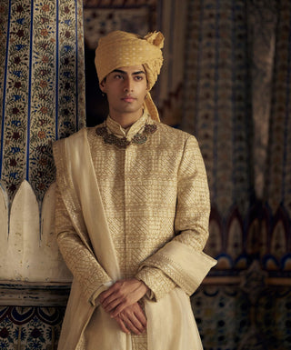 Gold Benarsi Brocade Sherwani Set by Nitika Gujral Men available on Indiaspopup.com