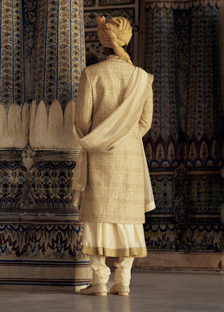 Gold Benarsi Brocade Sherwani Set by Nitika Gujral Men available on Indiaspopup.com