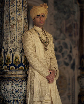 Gold Tonal Resham Sherwani Set by Nitika Gujral Men available on Indiaspopup.com