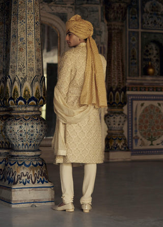 Gold Tonal Resham Sherwani Set by Nitika Gujral Men available on Indiaspopup.com