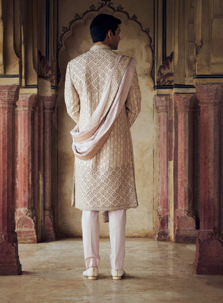 Blush Raw Silk Sherwani Set by Nitika Gujral Men available on Indiaspopup.com