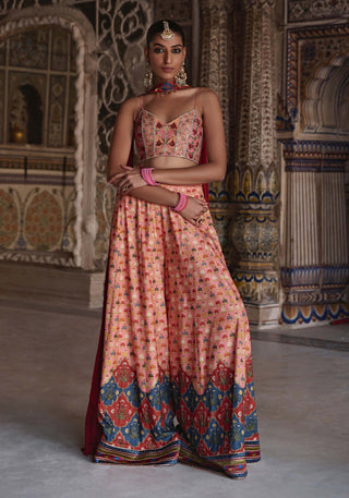 Saima Sunset Orange Sharara Set by Kalista available on Indiaspopup