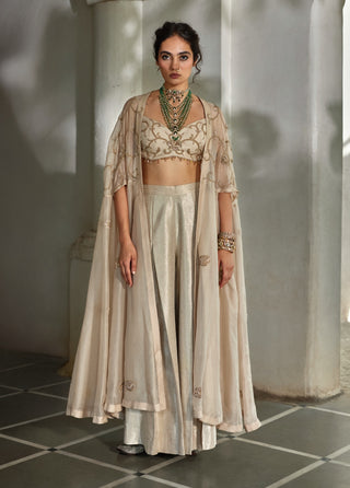 Oatmeal embroidered blouse, palazzos with cape