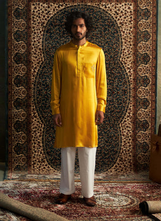 Marigold Modal Satin Kurta And Straight Pants by Charkhee Men available on Indiaspopup.com