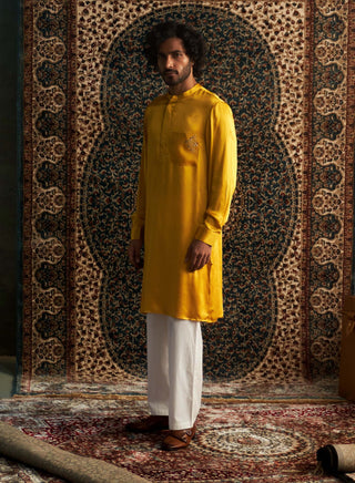 Marigold Modal Satin Kurta And Straight Pants by Charkhee Men available on Indiaspopup.com