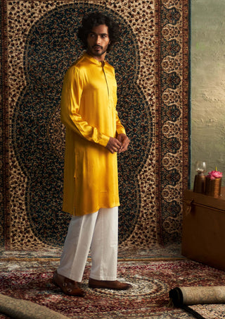 Marigold Modal Satin Kurta And Straight Pants by Charkhee Men available on Indiaspopup.com