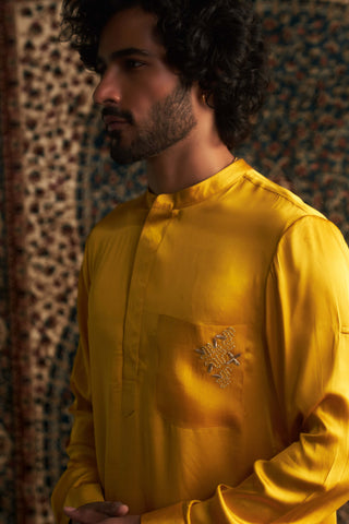 Marigold Modal Satin Kurta And Straight Pants by Charkhee Men available on Indiaspopup.com