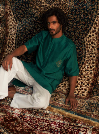 Emerald Green Short Sleeved Kurta And Pyjamas by Charkhee Men available on Indiaspopup.com