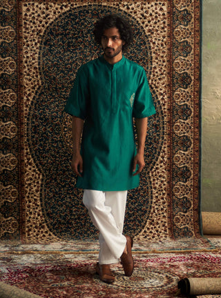 Emerald Green Short Sleeved Kurta And Pyjamas by Charkhee Men available on Indiaspopup.com