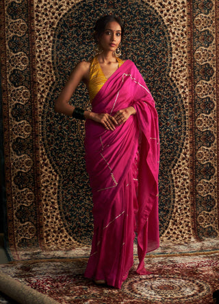 Rani pink embroidered chanderi sari and marigold blouse