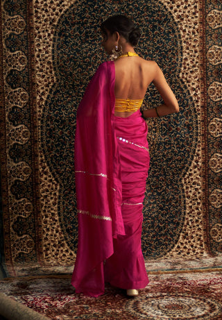 Rani pink embroidered chanderi sari and marigold blouse