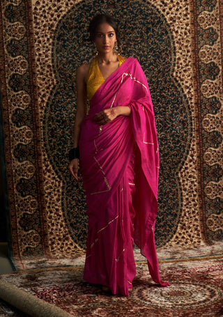 Rani pink embroidered chanderi sari and marigold blouse