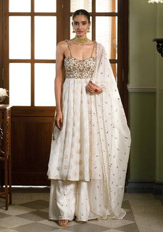 Ivory Fiza Strapless Anarkali And Sharara Set by Payal Singhal available on Indiaspopup