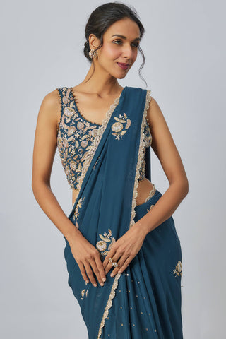 Teal blue embroidered choli and sari