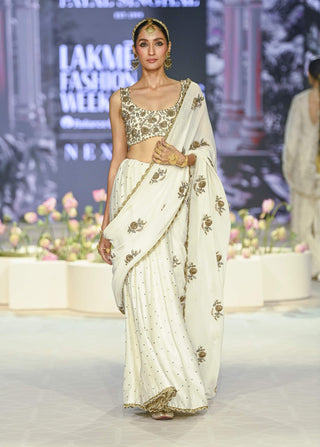 Najia off-white choli and embroidered sari