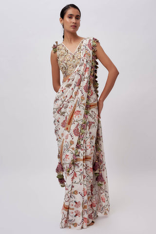 Cream embroidered choli and pre-stitched sari