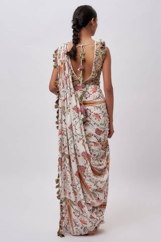 Cream embroidered choli and pre-stitched sari