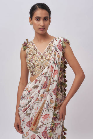 Cream embroidered choli and pre-stitched sari