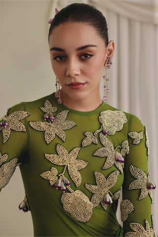 Sheer olive bodysuit and draped skirt