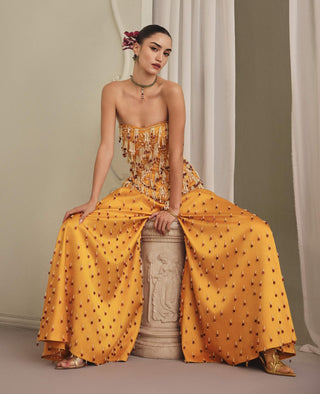 Yellow strapless top and wide palazzos